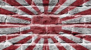 Very old dark red brick wall texture, flag of Japan