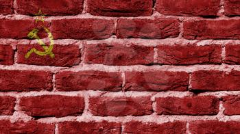 Very old dark red brick wall texture, flag of USSR
