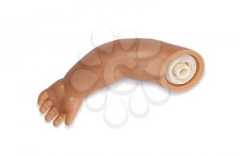 Separated arm of a doll, isolated on white