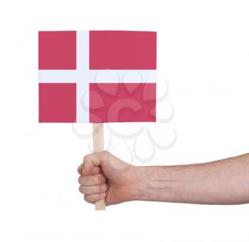 Hand holding small card, isolated on white - Flag of Denmark