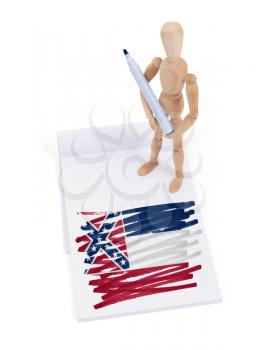 Wooden mannequin made a drawing of a flag - Mississippi
