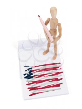 Wooden mannequin made a drawing of a flag - Liberia