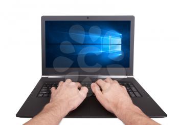 HEERENVEEN, NETHERLANDS, June 6, 2015: Laptop computer with Windows 10 background. Windows 10 is the new version of Windows OS by Microsoft Corporation; it starting July 29, 2015.