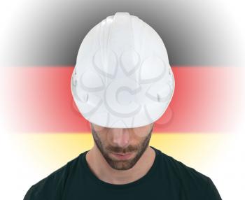 Isolated engineer with flag on background - Germany