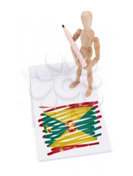 Wooden mannequin made a drawing of a flag - Grenada