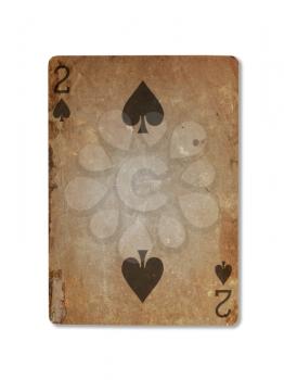 Very old playing card isolated on a white background, two of spades