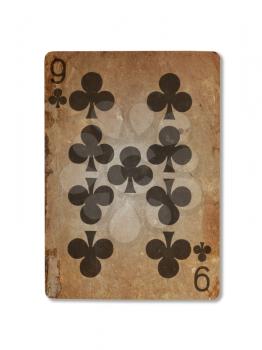 Very old playing card isolated on a white background, nine of clubs