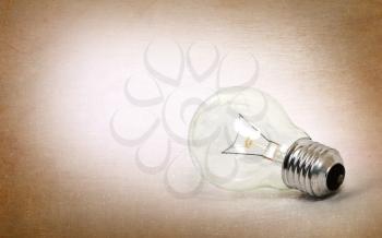 Old lightbulb isolated on a white background - Vintage look