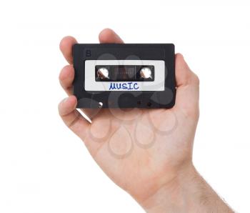 Vintage audio cassette tape, isolated on white background, music