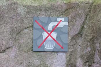 Do not drink water, sign on a wall