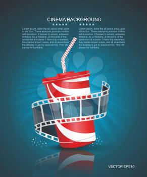 Cinema roll and cardboard cup with a straw on blue defocus background.