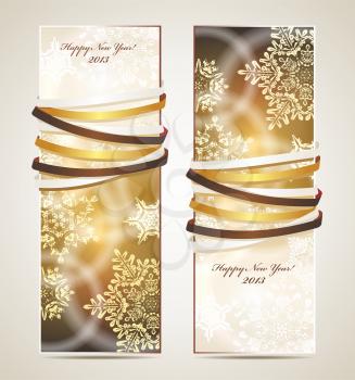 Greeting cards with ribbons, snowflakes and copy space.
