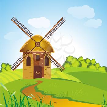 beautiful windmill landscape with a green glade and a footpath
