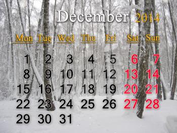 calendar for the December of 2014 year with winter forest