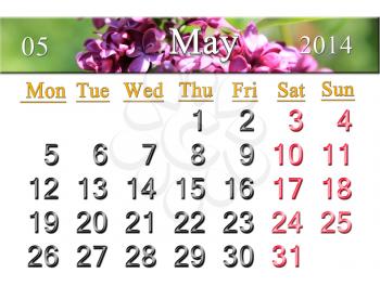 calendar for May of 2014 on the background of branch of lilac