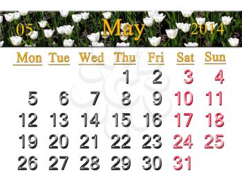 calendar for May of 2014 on the background of tulips on the flower-bed