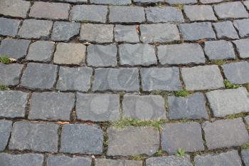road with cobblestone pavement with gray pattern