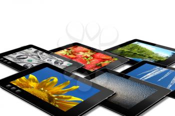 some black tablets with motley pictures isolated on white background