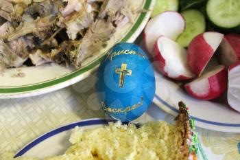 Easter egg with other products Easter cake, garden radish, cold boiled pork