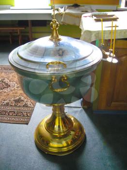 The image of religious place with metal tub