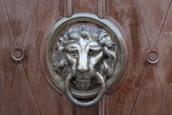 red tanned door-handle in shape of lion