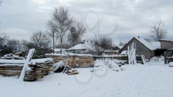 Rural manor in a white snow in winter