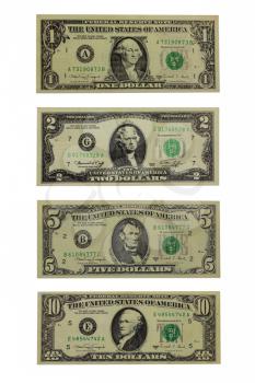 Banknotes of the American dollars face value 1, 2, 5 and 10 dollars isolated on a white background