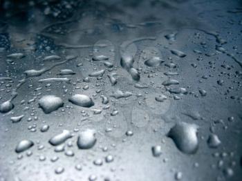 The image of droplets of water on glass