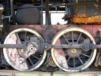 Huge wheels of an ancient steam locomotive
