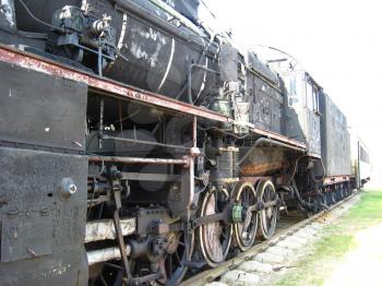 The image of ancient black steam locomotive
