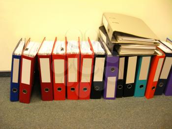 a lot of folders with the information at office