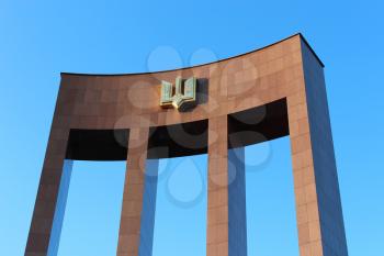 big monument with trident in the blue sky of Lvov city in Ukraine
