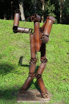 image of figure of abstract robot made from metal shapes