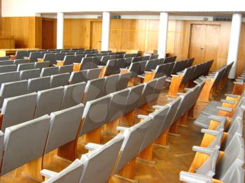 The image of conference room with dark chairs