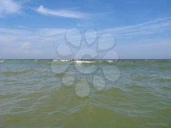 panorama of the sea and people bathing in the sea