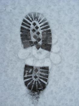 image of trace of shoe on a snow