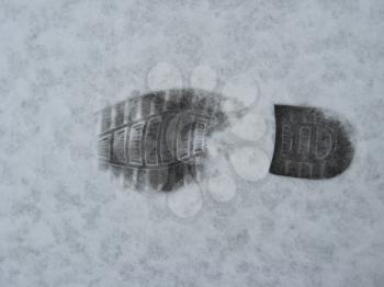 image of trace of shoe on a snow