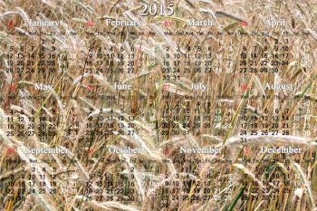 office calendar for 2015 year on the field of wheat background