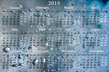 calendar for 2015 year on the glass surface with drops