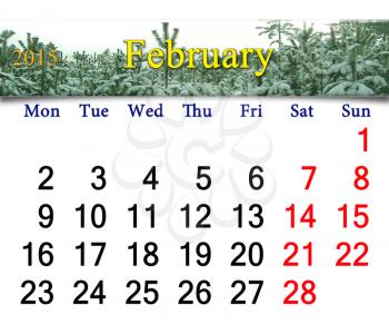 calendar for the February of 2015  on the background of snowy pines and hoarfrost on the trees