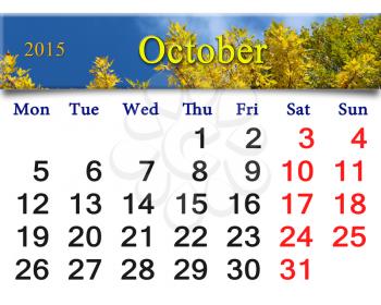 calendar for October of 2015 with the ribbon of moss and leaves
