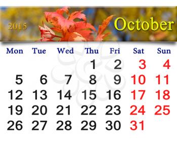 calendar for October of 2015 with the ribbon of red leaves