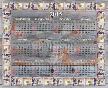 calendar for 2015 year in the American dollars' frame on the wooden board