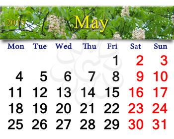 calendar for May of 2015 year on the background of blossoming chestnut tree
