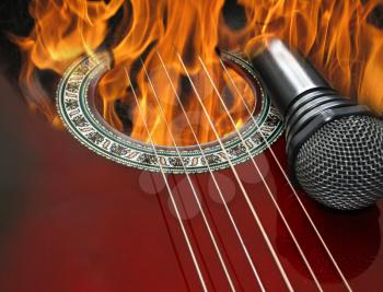 guitar and microphone burning in the bright fire