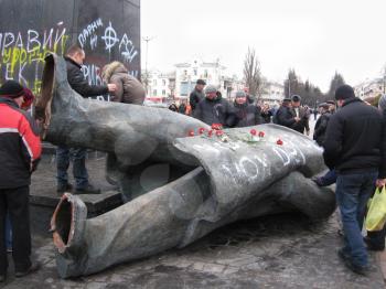 thrown big bronze monument to Lenin the leader of world proletariat in Chernihiv