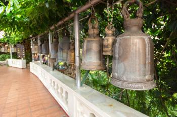 Steel bells at Wat Saket temple at the Golden Moun in Bangkok, Thailand in a summer day