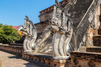 Ancient pagoda at Wat Chedi Luang temple in Chiang Mai, Thailand in a summer day