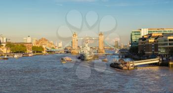 HMS Belfast warship and Tower Bridge in London in a beautiful summer day, England, United Kingdom