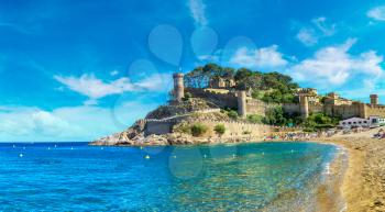 Beach at Tossa de Mar and fortress in a beautiful summer day, Costa Brava, Catalonia, Spain